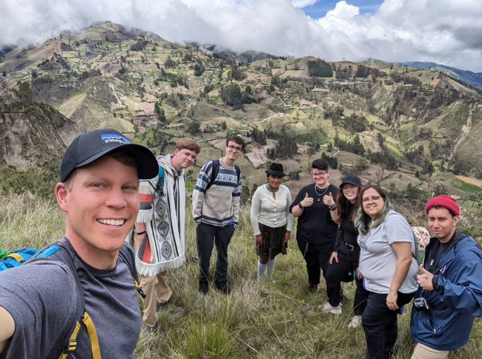 Professor and students hiking near Chugchilan, Ecuador