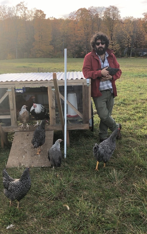 Carter with chickens