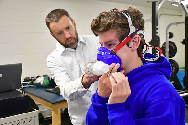 MCLA Biology faculty and student