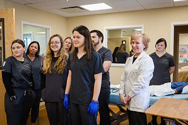 Group of MCLA nursing students and their instructor