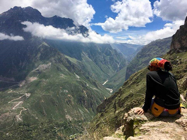 Student overlook a valley in Peru