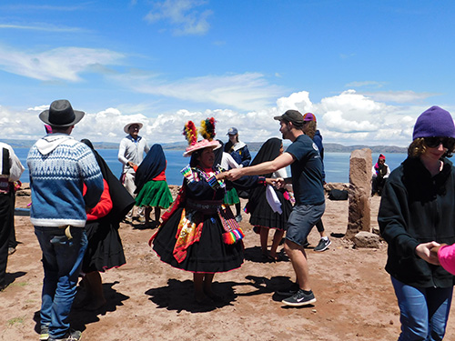 People dancing at Lake Titicaca