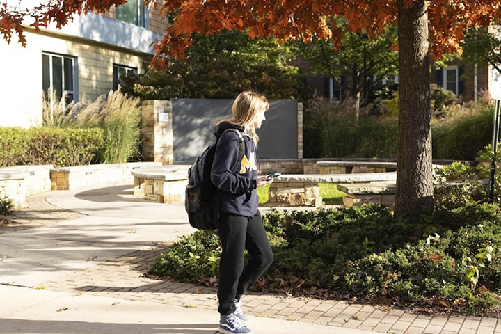 Student on beautiful campus