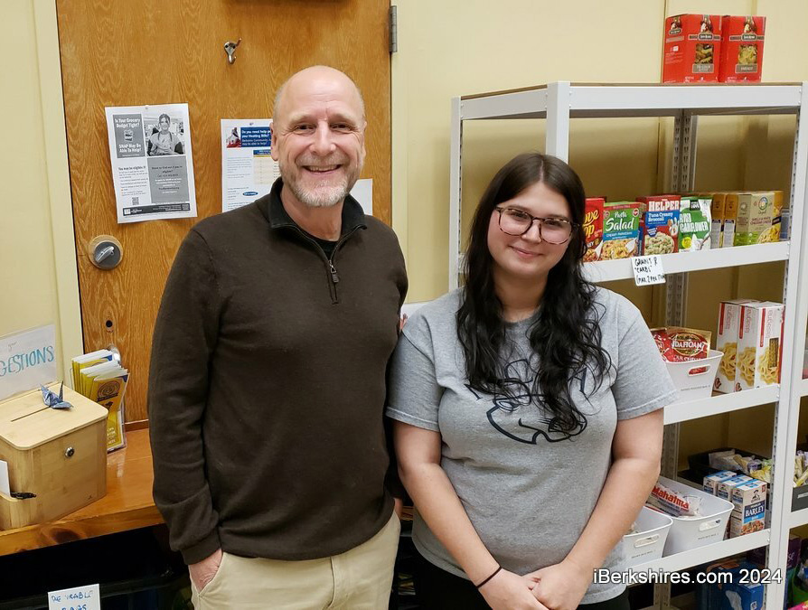 Image of MCLA Volunteer Center Spencer Moser and staffer and student Isabella Fuller at the Essential Needs Center