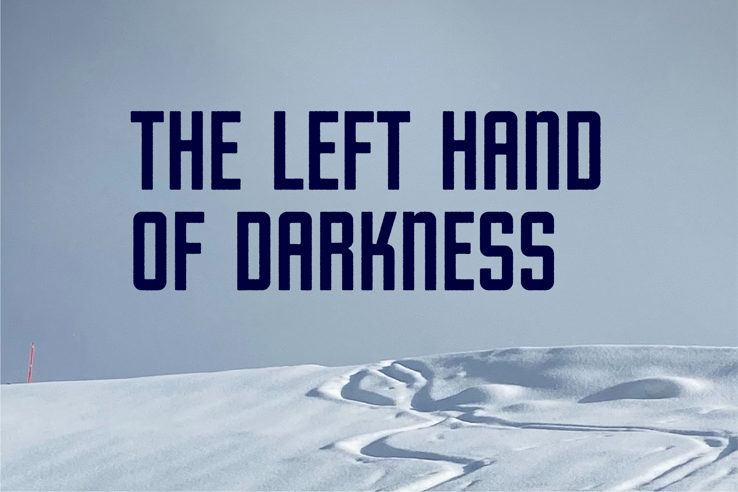 Snow-covered hill with text saying "The Left Hand of Darkness"
