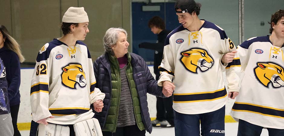MCLA hockey players with a senior