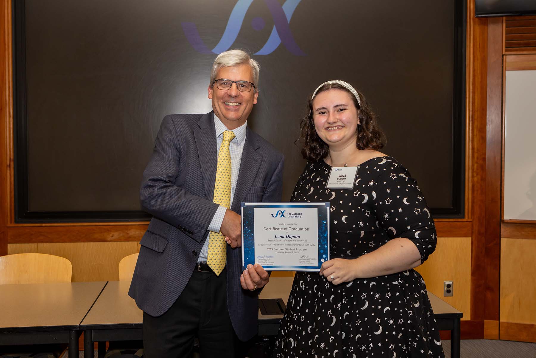 student receiving award at summer program